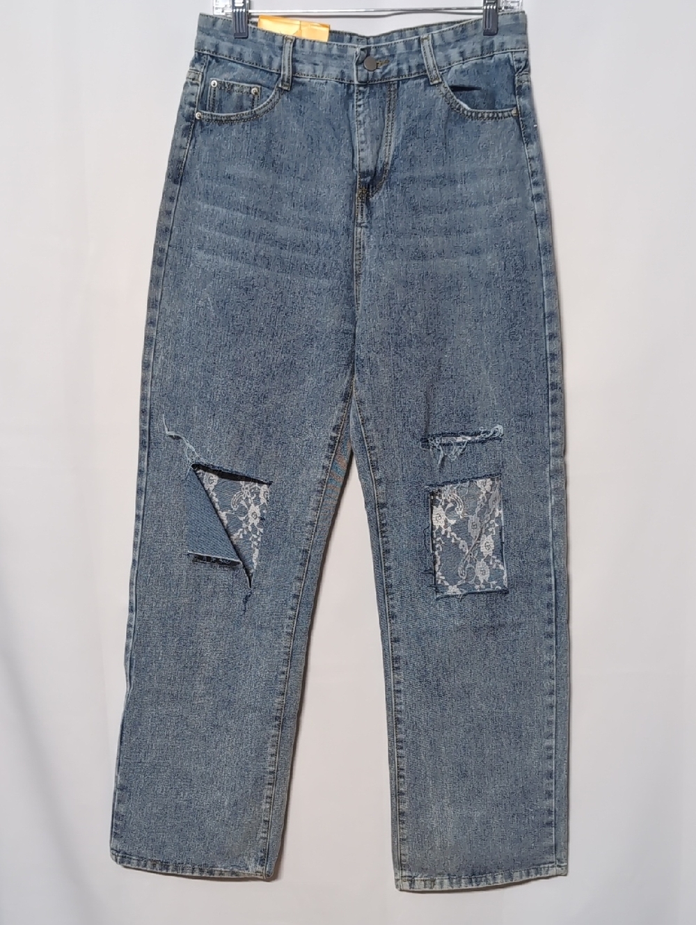 Ripped Jeans With Lace Accent